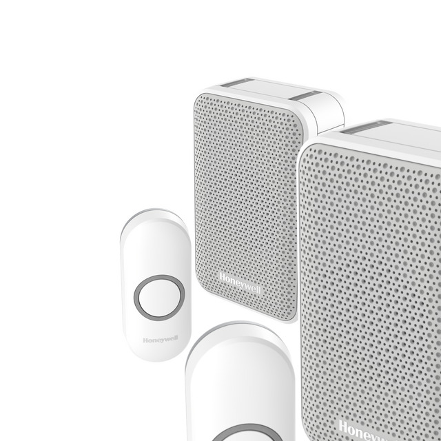 Trådlös dörrsignal och knapp med vit och grå design, Honeywell-logotyp.