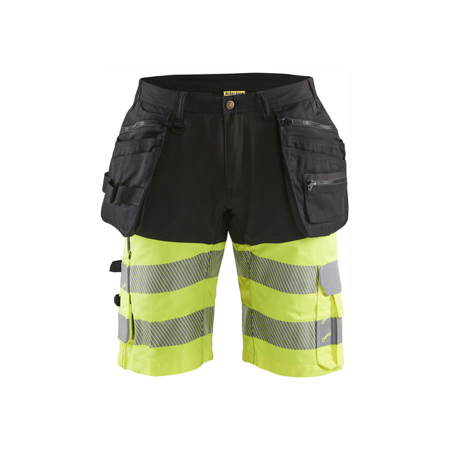 Arbetsbyxor i svart och neon-gul med fickor och reflexdetaljer.