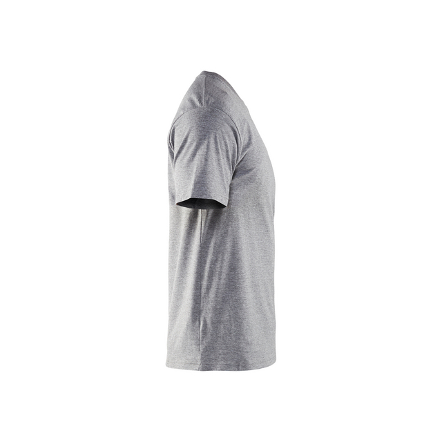 Grå T-shirt sedd från sidan mot vit bakgrund.