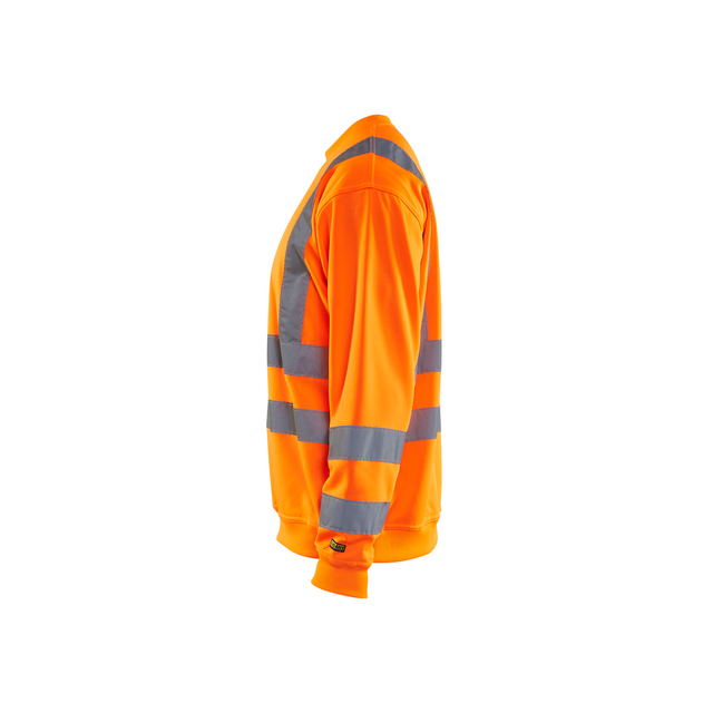 Orange reflexjacka med grå reflexband, sedd från sidan.