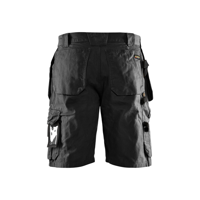 Svarta arbetsshorts med flera fickor och hällor, set bakifrån.