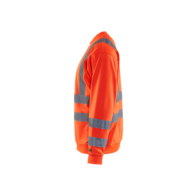 Orange varseltröja med grå reflexband runt ärmar och över bröstet i profilvy.
