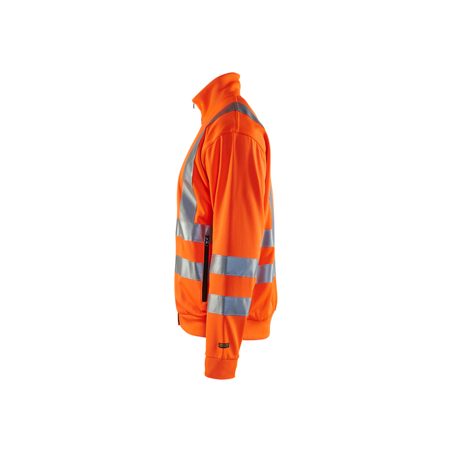 Orange jacka med reflexband, sedd från sidan.