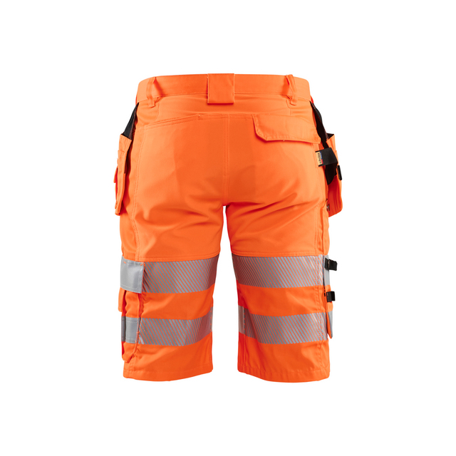 Orange shorts med reflexband och fickor.