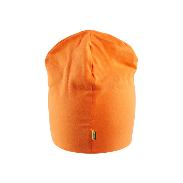 En orange mössa med etikett i nederkant.