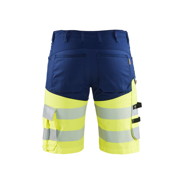 Blå och gula varselshorts med flera fickor och reflexdetaljer, sedd bakifrån.