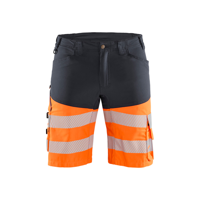 Arbetsbyxor i orange och svart med reflexband runt benen.