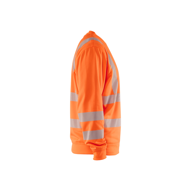 Orange tröja med horisontella reflexband över bröst och armar, sedd från sidan.