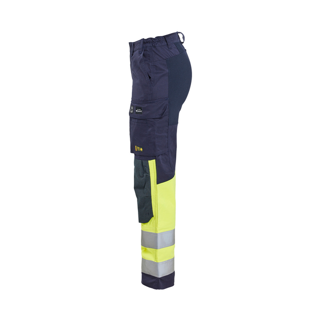 Arbetsbyxa i mörkblått och neongult med reflexband på benen, flera fickor och hållare för verktyg.