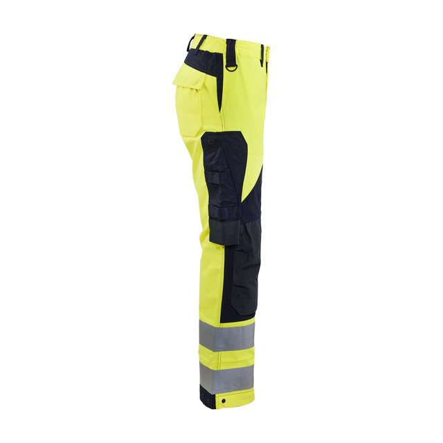 Arbetsbyxor i neongul och mörk färg med reflexband vid anklarna och flera fickor.