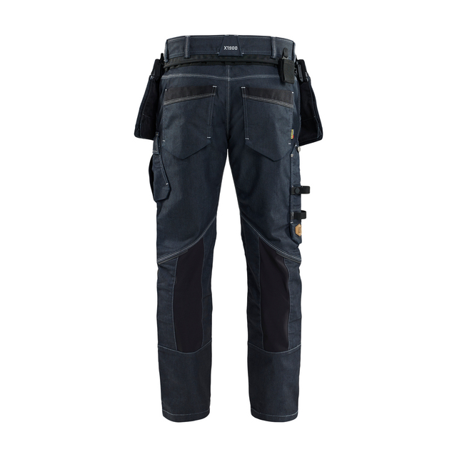 Svarta arbetsbyxor med många fickor, hällor och förstärkta knän, sedd bakifrån. Märke synligt på midjebandet.